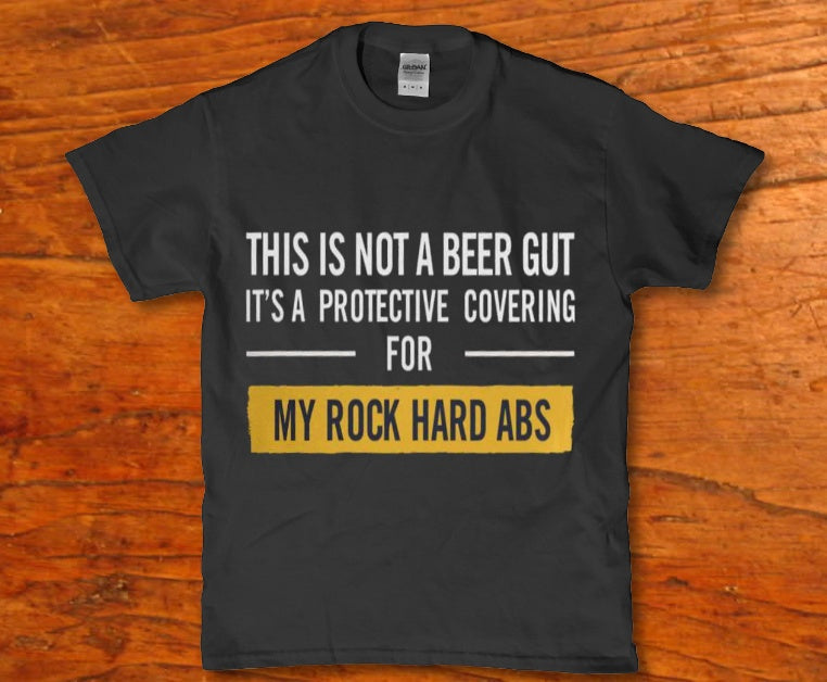 This is not a beer gut it's a protective covering t-shirt - Premium t-shirt from MyDesigns - Just $16.95! Shop now at Lees Krazy Teez