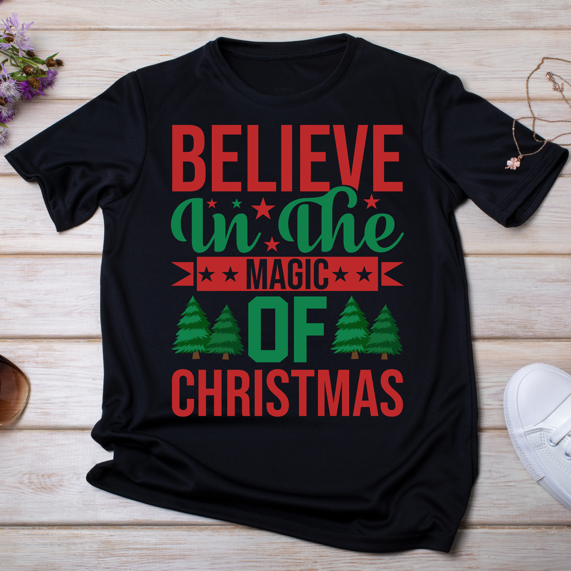 Believe in the magic of Christmas Women's holiday t-shirt - Premium t-shirt from Lees Krazy Teez - Just $19.95! Shop now at Lees Krazy Teez