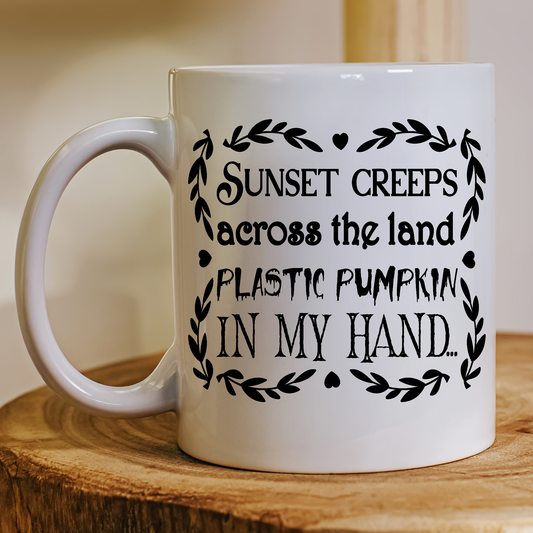 Sunset creeps across the land plastic pumpkin in my hand Halloween Mug - Premium mugs from Lees Krazy Teez - Just $24.95! Shop now at Lees Krazy Teez